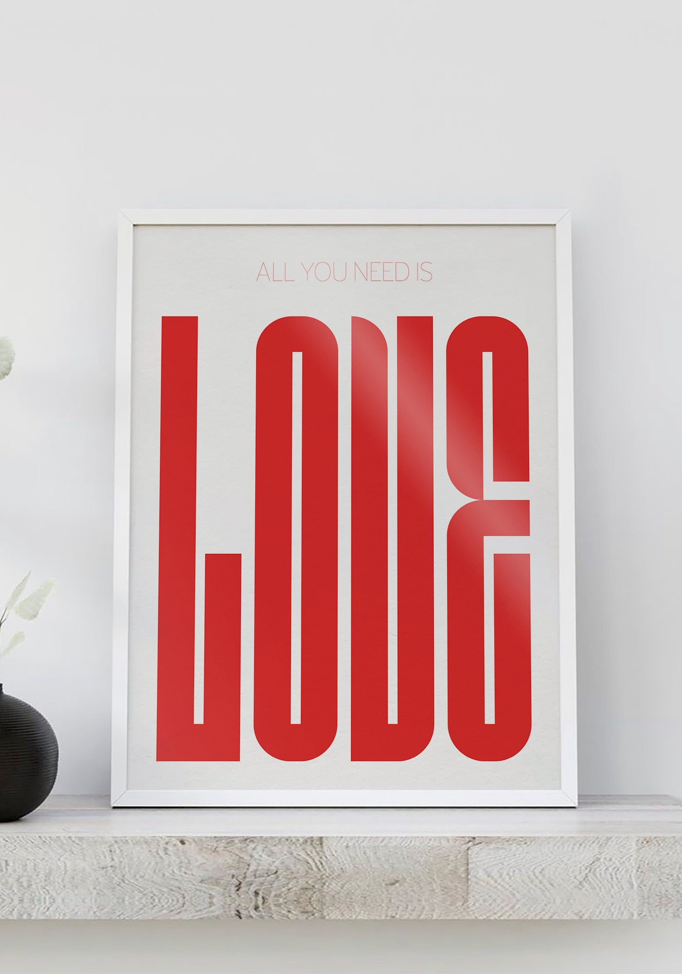 L'affiche typographique "All you need is love" en 21x30 cm de chez Studio Topo