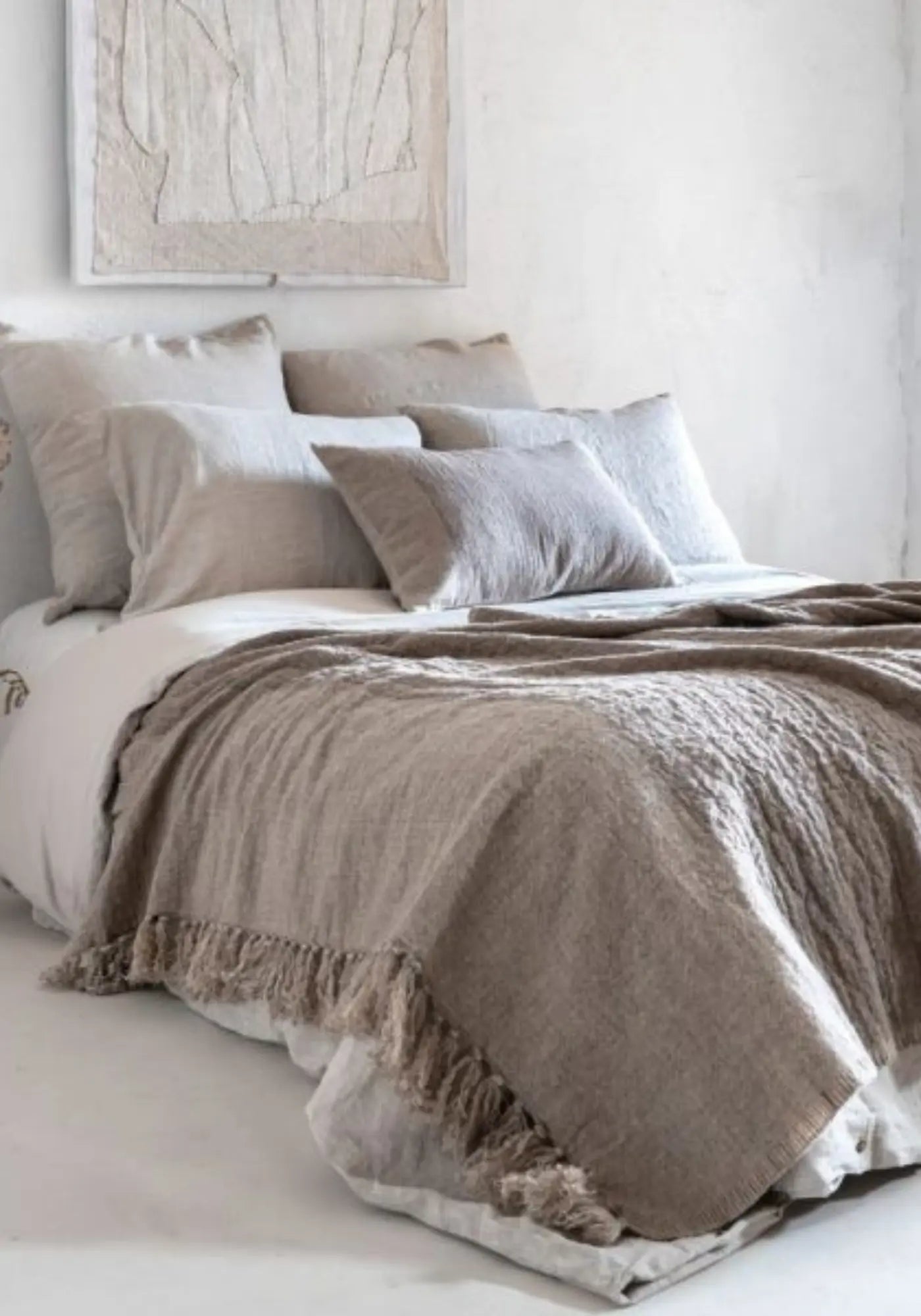 Le plaid perla 140 x 220 cm marmotte de chez Bed and Philosophy 