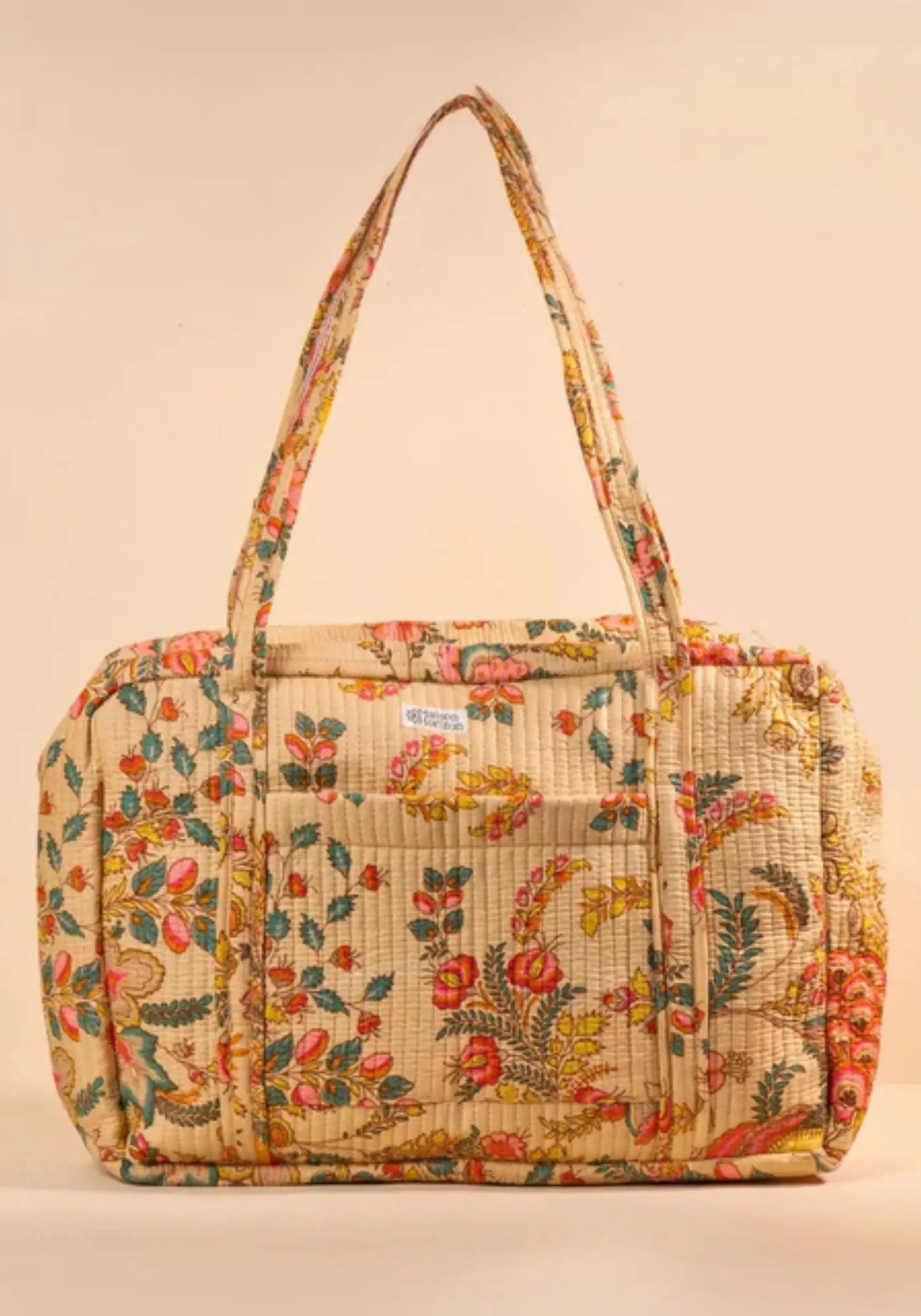 Le sac week-end ou à langer beige pastel de chez Maison Horizon 