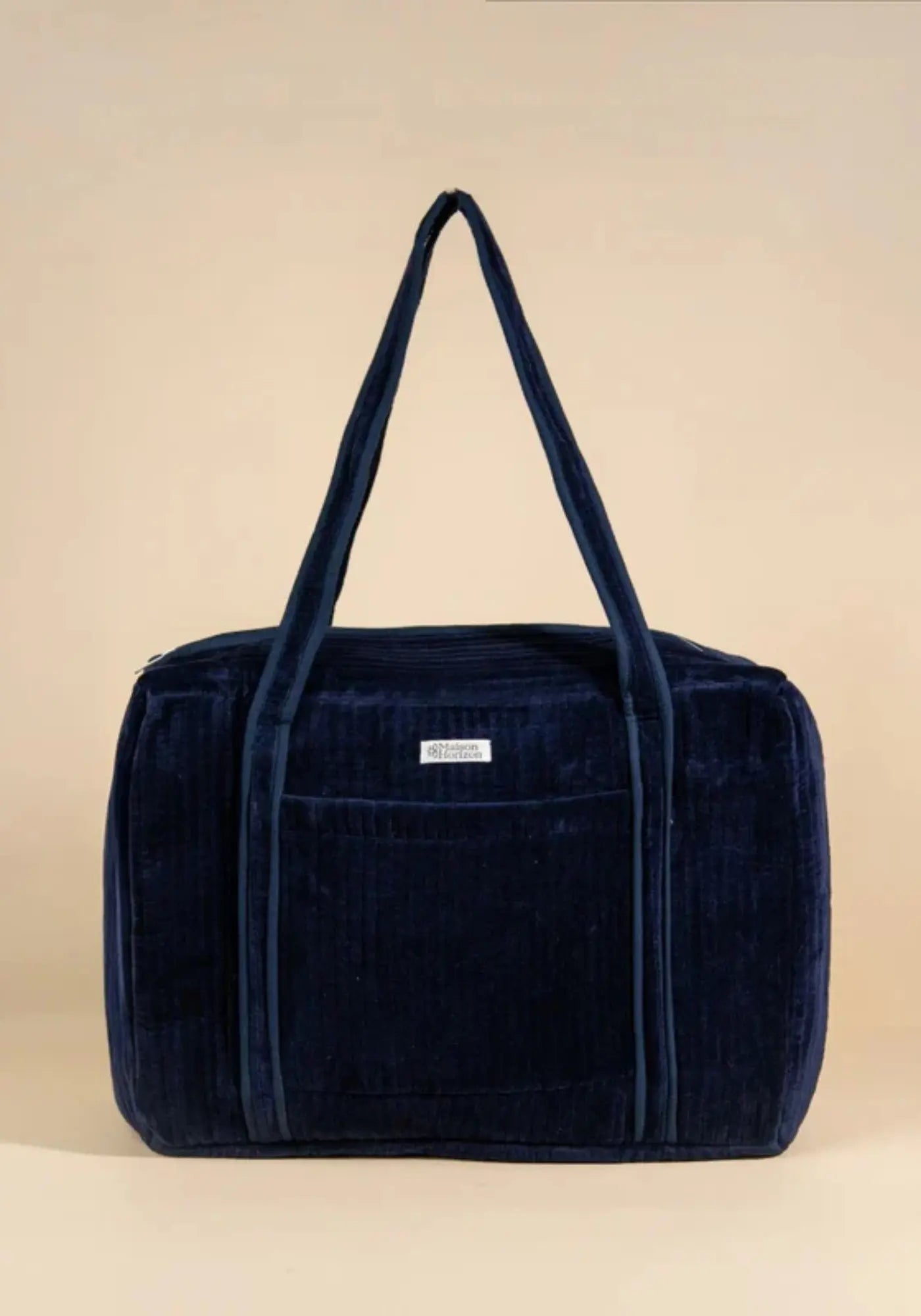 Le sac week-end ou à langer lola velours bleu nuit de chez Maison Horizon 
