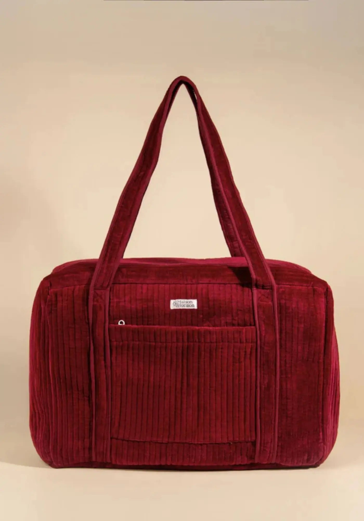 Le sac week-end ou à langer lola velours lie de vin de chez Maison Horizon 