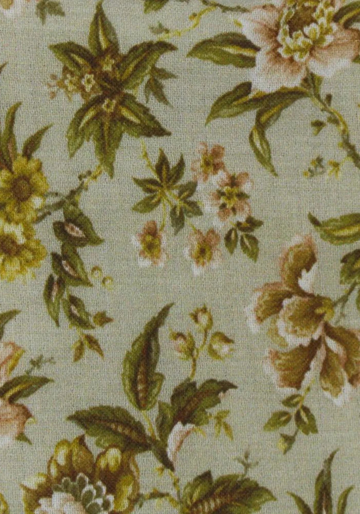 Zoom sur le motif floral jaune et beige du torchon en coton Eva de chez Héritage Studio