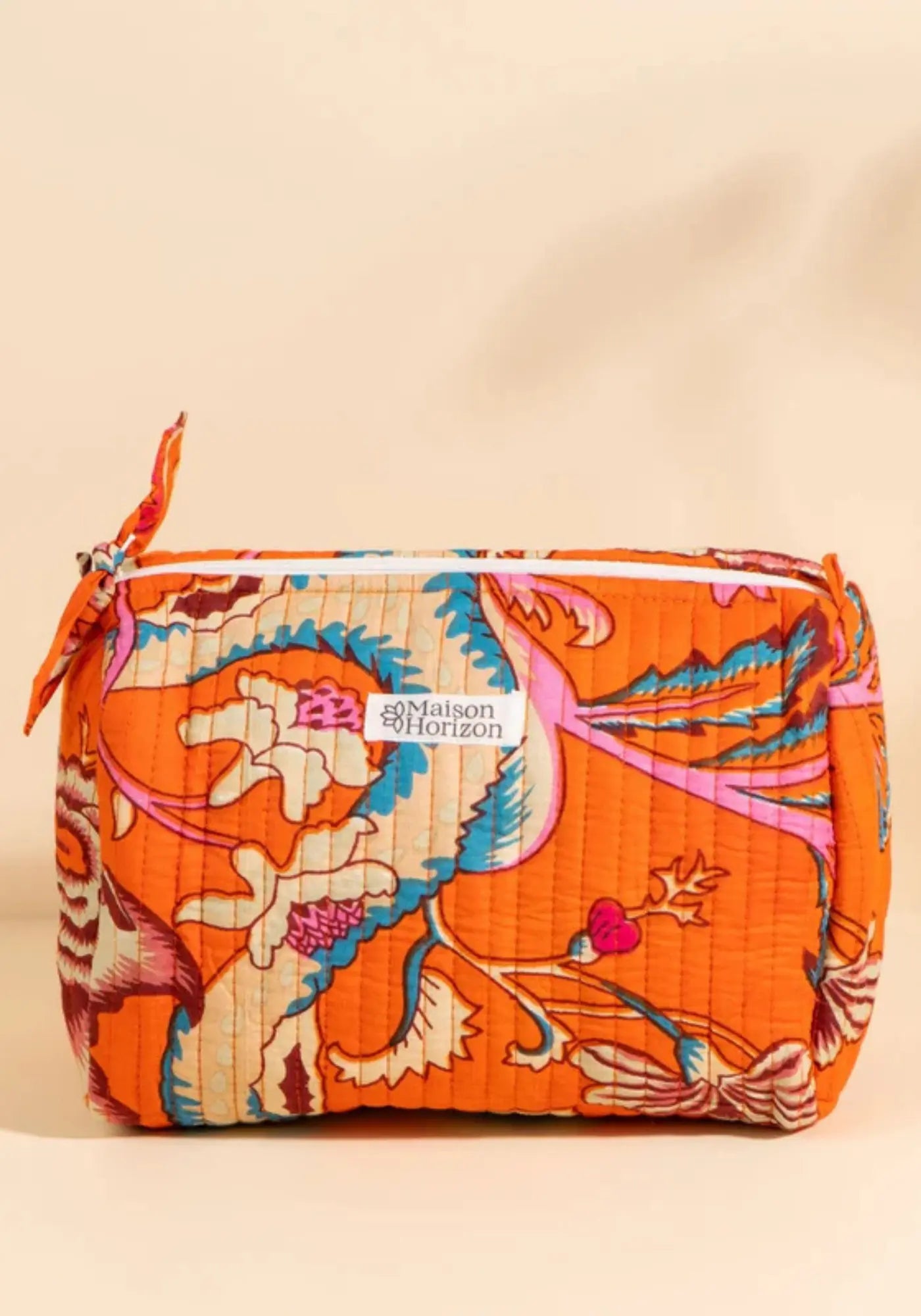 La trousse de toilette Banita orange vintage de chez Maison Horizon