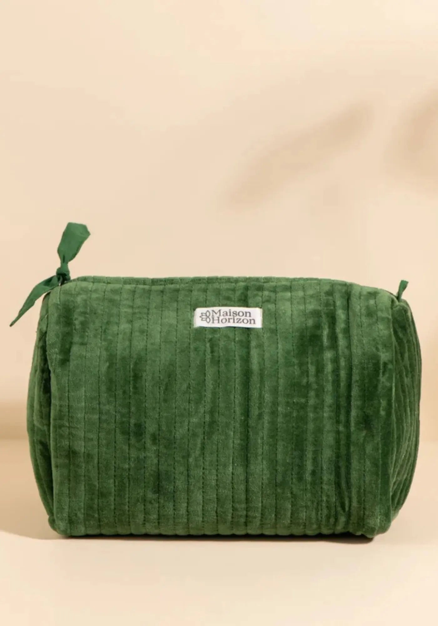 La trousse de toilette Banita velours emeraude de chez Maison Horizon