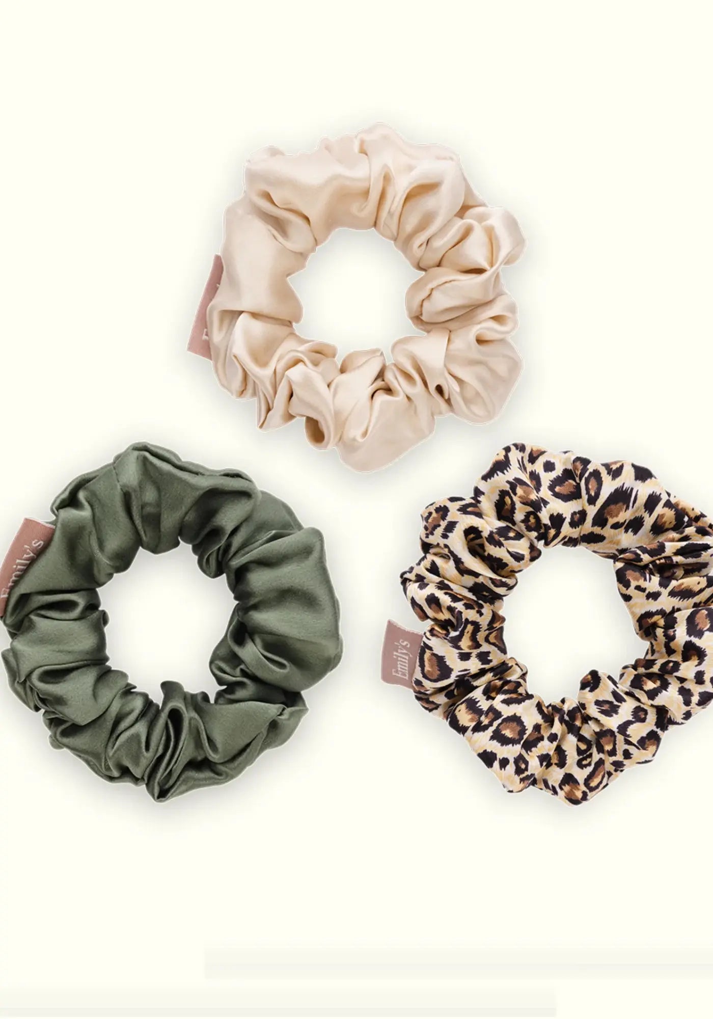 Le crackers de 3 chouchous M vert sauge, champagne, léopard de chez Emily's Pillow